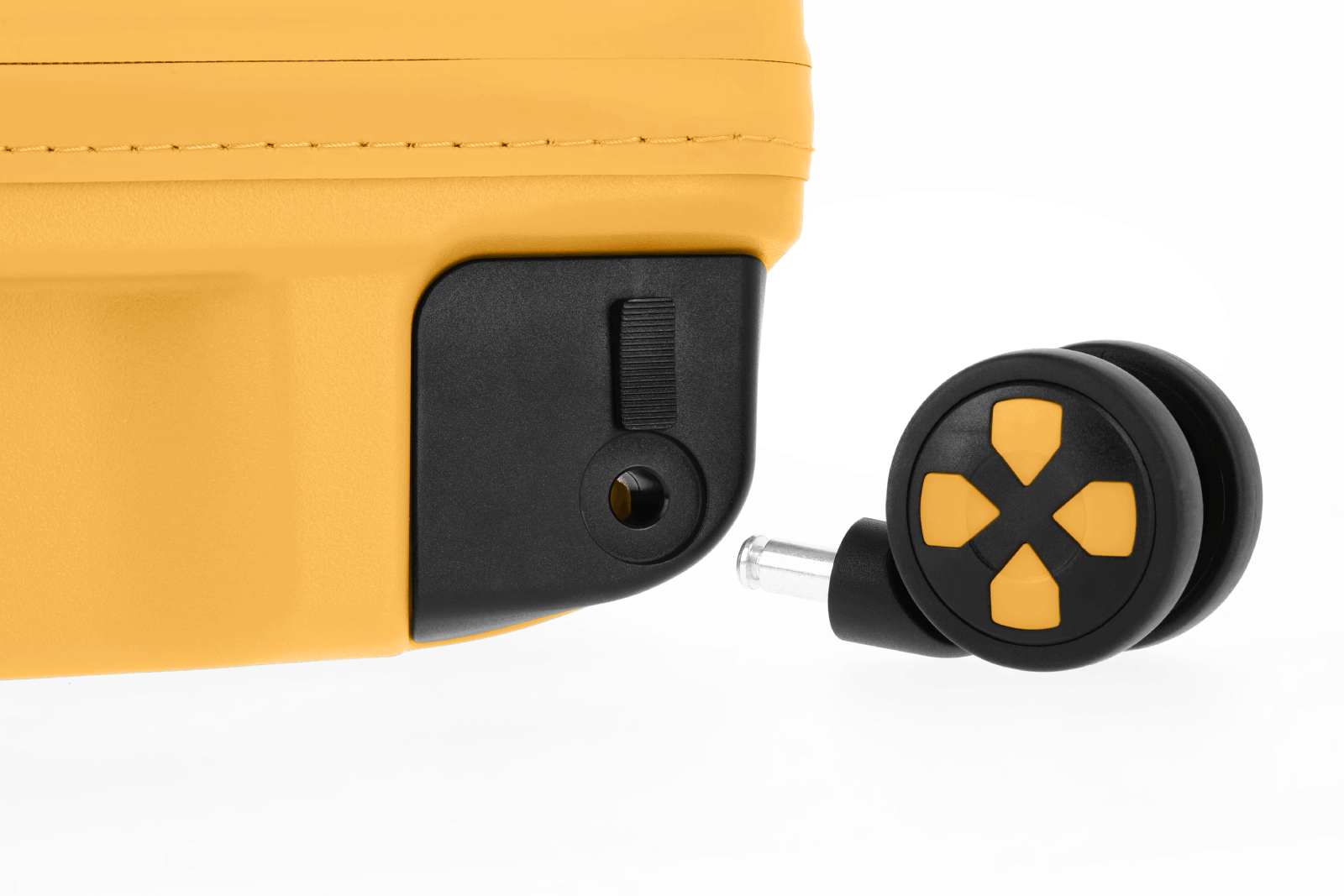 Nahaufnahme eines gelben Koffers mit abnehmbarer Rolle Detailaufnahme der abnehmbaren Rolle eines gelben Koffers